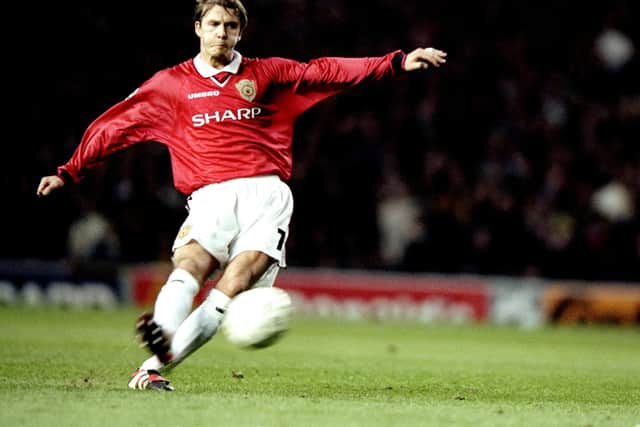 David Beckham pictured in action for Man Utd back in 1999.