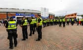 Police make a barrier outside Hampden Park after an incident involving supporters ahead Premier Sports Cup last sixteen match between Rangers and St Johnstone. (Photo by Craig Williamson / SNS Group)