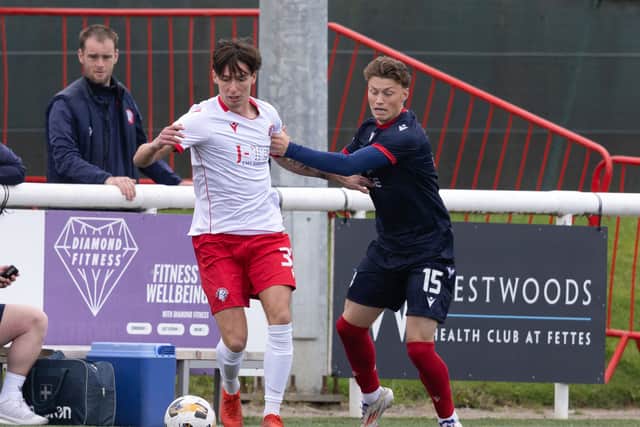Aiden Denholm has moved to Ross County on loan from Hearts.