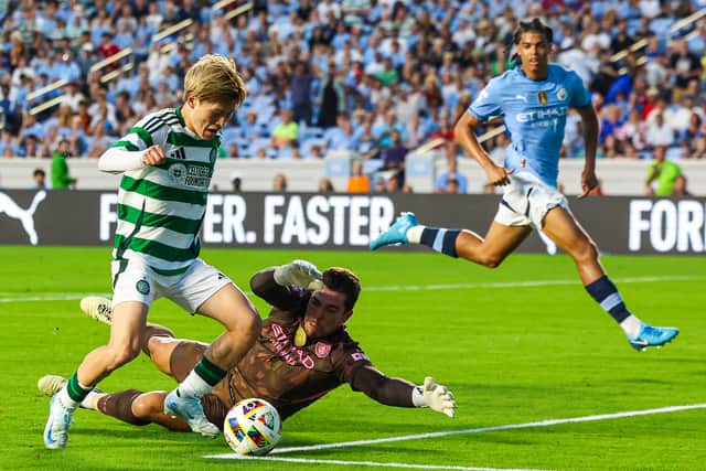 Kyogo Furuhashi scores for Celtic against Manchester City in a pre-season friendly in North Carolina on July 23, 2024.  (Photo by Ross MacDonald / SNS Group)