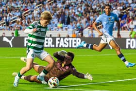 Kyogo Furuhashi scores for Celtic against Manchester City in a pre-season friendly in North Carolina on July 23, 2024.  (Photo by Ross MacDonald / SNS Group)