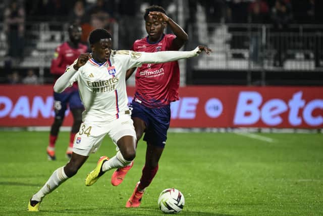 Lyon's French midfielder Mahamadou Diawara (left) is a reported transfer target for Celtic. (Photo by JEAN-PHILIPPE KSIAZEK/AFP via Getty Images)