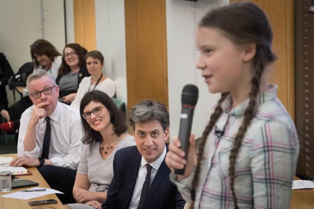 From left, former Environment Secretary Michael Gove, Liberal Democrat MP Layla Moran, Secretary of State for Energy Security and Net Zero Ed Miliband, and climate activist Greta Thunberg at Westminster to discuss cross-party action to address climate change in 2019.
