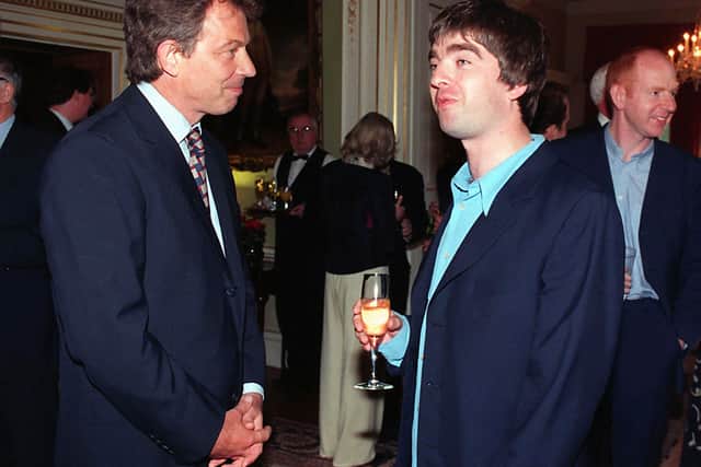 Oasis star Noel Gallagher meets the then Prime Minister Tony Blair in 1997 (Picture: Rebecca Naden/PA)