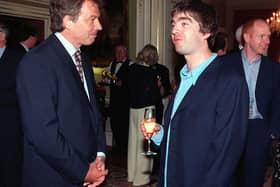 Oasis star Noel Gallagher meets the then Prime Minister Tony Blair in 1997 (Picture: Rebecca Naden/PA)