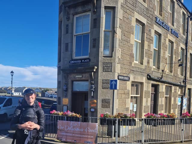 Standing next to the world's shortest street 