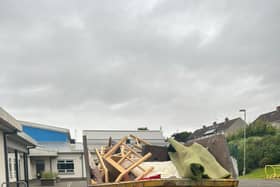 A skip full of classroom equipment in Midlothian
