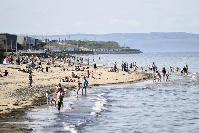 Bathers enjoy the warmer weather at Portobello Beach. Picture: Lisa Ferguson
