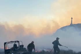 Gamekeepers tackling a wildfire at Cannich, one of Scotland's largest wildfires that devastated part of an RSPB reserve 