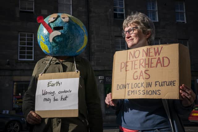Edinburgh Climate Coalition protesting outside the SNP conference. Image: Press Association.