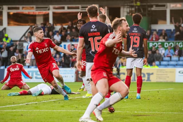 Kevin Nisbet netted the stoppage-time winner for Aberdeen.