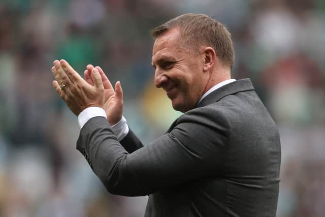 Celtic manager Brendan Rodgers salutes the fans following the comprehensive 3-0 win over Rangers.