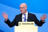 First Minister John Swinney delivers his address at the SNP annual national conference at the Edinburgh International Conference Centre. Picture: Jane Barlow/PA Wire