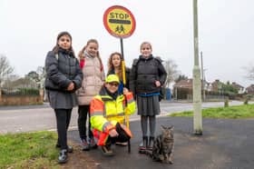 From the left - Elena Michalczuk, 11, Grace Pratt, 10, Cordelia Donald, 9, Amy Brooks, 11, with Klara Remmington and Bandit the cat.
