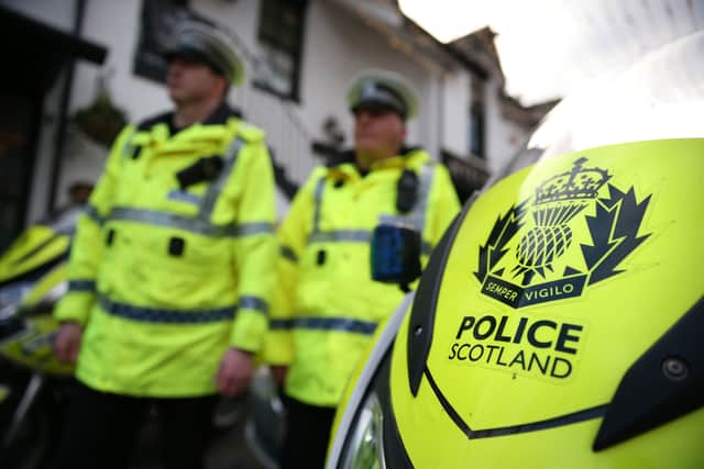 Almost 1,000 Scottish police officers are eligible to retire before next summer, it has emerged, and the Scottish Police Federation (SPF) has warned that Police Scotland's strength would suffer if recruitment did not keep up with the retirement rate. Picture: Andrew Milligan/PA Wire