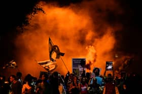 People attend a rally demanding a cease-fire deal and the immediate release of hostages held by Hamas in the Gaza Strip after the deaths of six hostages in the Palestinian territory in Tel Aviv, Israel, on Monday. Picture: AP Photo/Ariel Schalit