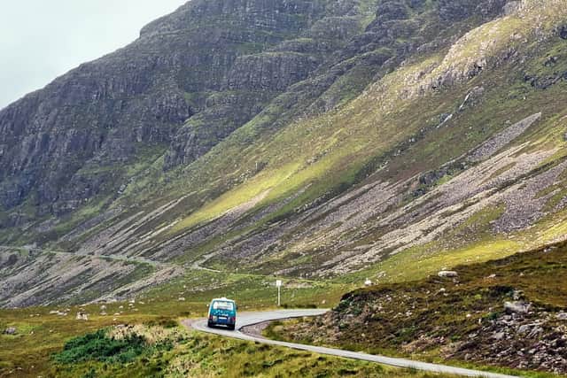 A vehicle drives on the North Coast 500 route, a few miles outside of Applecross. Picture: John Devlin