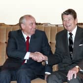 Soviet leader Mikhail Gorbachev and US President Ronald Reagan were all smiles at this meeting in San Francisco in 1990 but relations had been extremely tense just a few years before (Picture: Laski Diffusion)