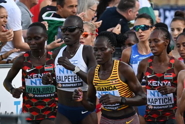 (From L to R) Kenya's Rosemary Wanjiru, Israel's Lonah Chemtai Salpeter, Uganda's Rebecca Cheptegei and Kenya's Selly Chepyego Kaptich in the women's marathon final during the World Athletics Championships in Budapest on August 26, 2023. (Photo by Ferenc ISZA / AFP) (Photo by FERENC ISZA/AFP via Getty Images)