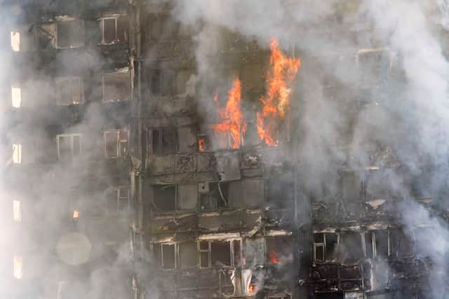 Smoke billows from a fire that has engulfed the 24-storey Grenfell Tower in west London. Picture: Rick Findler/PA Wire