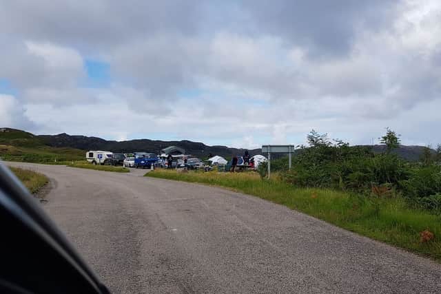 This is a viewpoint on the road into Kinlochbervie which, according to locals, has turned into a campground and the garden immediately adjacent is often used as a toilet.