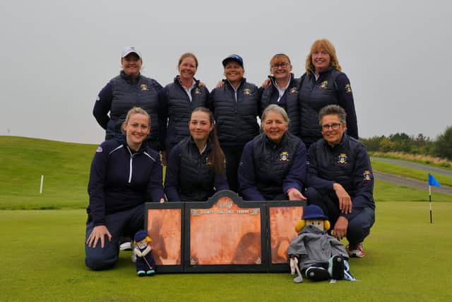 Midlothian shows off the trophy at Eyemouth after landing back-to-back victories in the Scottish Women’s County Finals