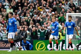 Rangers' Connor Barron (centre) and Robin Propper look dejected during the 3-0 defeat to Celtic. (Photo by Rob Casey / SNS Group)