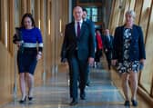 Deputy First Minister Kate Forbes, First Minister John Swinney and Finance Secretary Shona Robison.