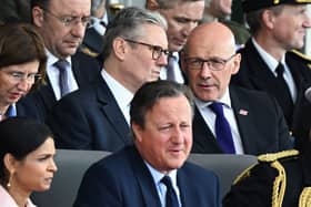 Three men who are cutting public services