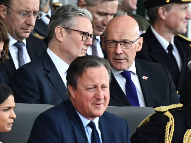 Three men who are cutting public services