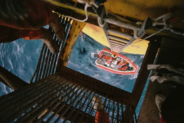 Greenpeace activists scaled and took up residence on the Brent Spar, a disused oil platform to stop Shell, from dumping it at sea. Picture: Greenpeace / David Sims