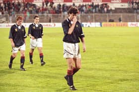 Scoltand defender Dave McPherson trudges off after the 5-0 defeat to Portugal in 1993.