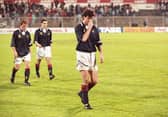Scoltand defender Dave McPherson trudges off after the 5-0 defeat to Portugal in 1993.