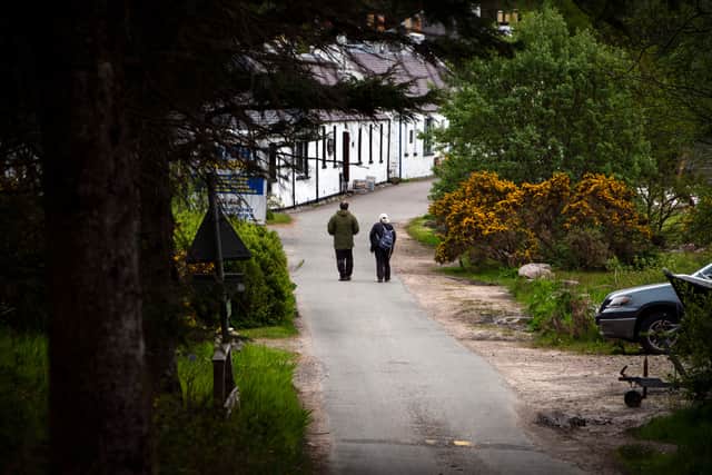 Hikers arrive in Inverie on the Knoydart peninsular.