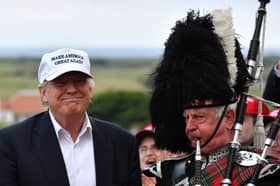 A piper plays as Donald Trump opens his Trump Turnberry golf resort in 2016 (Picture: Jeff J Mitchell)