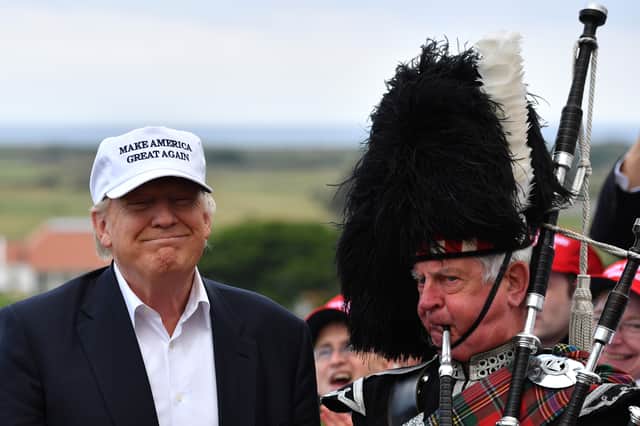 A piper plays as Donald Trump opens his Trump Turnberry golf resort in 2016 (Picture: Jeff J Mitchell)