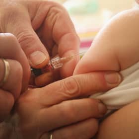 A child is given their MMR vaccination. (Photo: Sean Gallup/Getty Images)