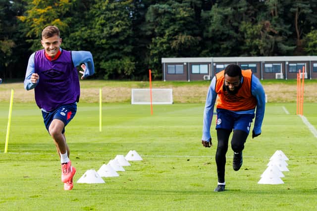 Hearts winger Kenneth Vargas (left) and midfielder Beni Baningime train ahead of Saturday's trip to Celtic. (Photo by Mark Scates / SNS Group)