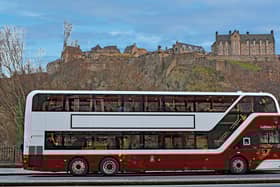 Live arrival times are now showing on Edinburgh's bus tracking system, more than three years behind schedule