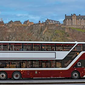 Live arrival times are now showing on Edinburgh's bus tracking system, more than three years behind schedule