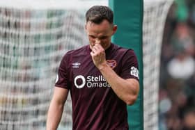 Lawrence Shankland looks dejected as he leaves the Celtic Park pitch at the weekend. Cr: SNS Group.