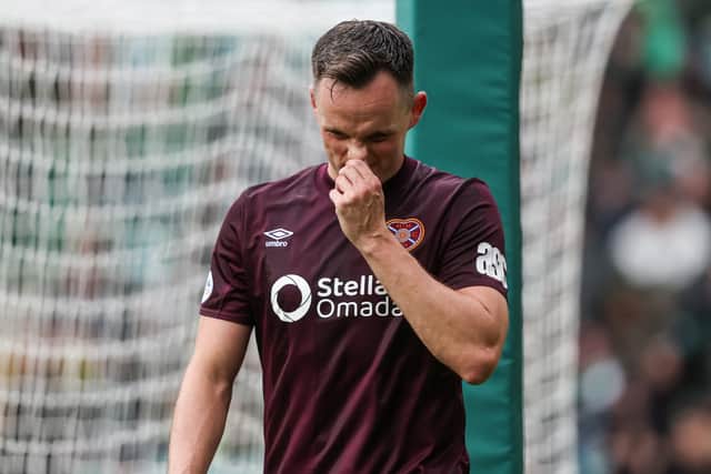 Lawrence Shankland looks dejected as he leaves the Celtic Park pitch at the weekend. Cr: SNS Group.