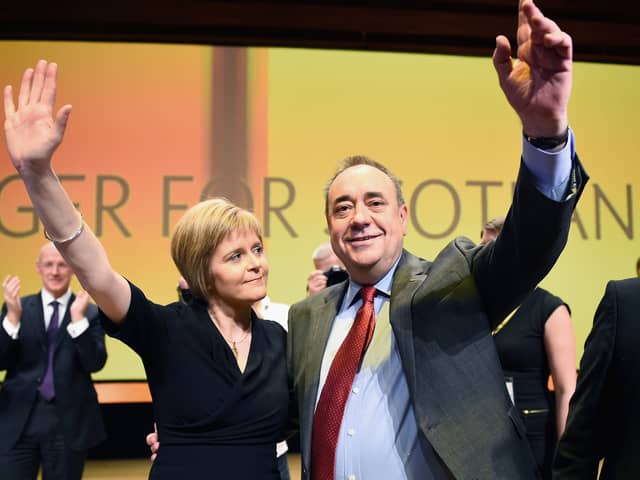 Nicola Sturgeon and Alex Salmond after he gave his last SNP conference speech as party leader in November 2014 (Picture: Jeff J Mitchell)