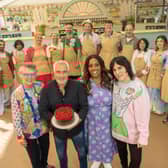The Great British Bake Off judges Prue Leith and Paul Hollywood, and presenters Alison Hammond and Noel Fielding with 2024 contestants (back row, left to right) Illiyin, Dylan, Sumayah, Nelly, John, Christiaan, Andy, Mike, Jeff, Hazel, Georgie and Gill. 