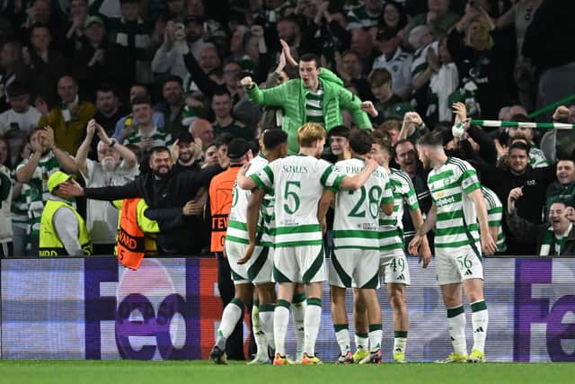 Celtic players celebrate after Adam Idah made it 5-1 over Slovan Bratislava. (Photo by ANDY BUCHANAN/AFP via Getty Images)