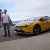 Scotsman writer Steven Chisholm with the 2024 Toyota Prius ahead of a test drive near Loch Lomond. Credit Steven Chisholm