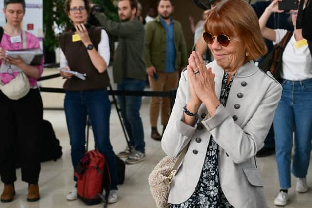 Gisele Pelicot acknowledges applause as she leaves the courtroom in Avignon during the trial of her former partner Dominique, who is accused of drugging her over a ten-year period and inviting strangers to rape her (Picture: Christophe Simon)