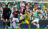 Referee Colin Steven awarded a penalty to Hearts for this handball by Celtic defender Liam Scales, but overturned his decision following a VAR intervention. (Photo by Ross MacDonald / SNS Group)