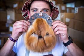 Alastair Young, 31 with a sporran. William E Scott and Son in Edinburgh have been handmaking traditional sporrans since 1937. Picture: Katielee Arrowsmith/SWNS