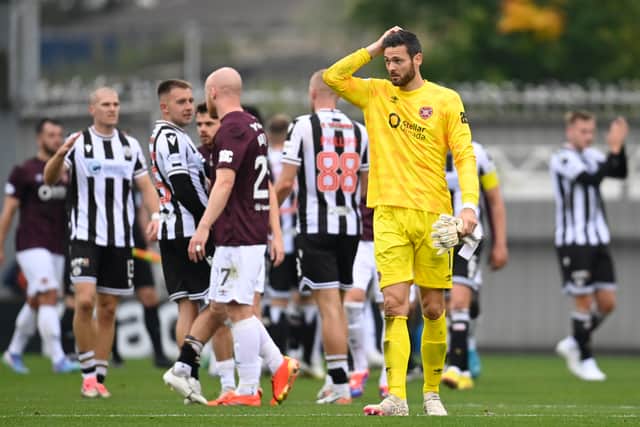 Hearts players left the pitch dejected after the defeat at St Mirren. 